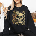 Skull Between Flowers Sweatshirt — Floral & Checkered Gothic Graphic