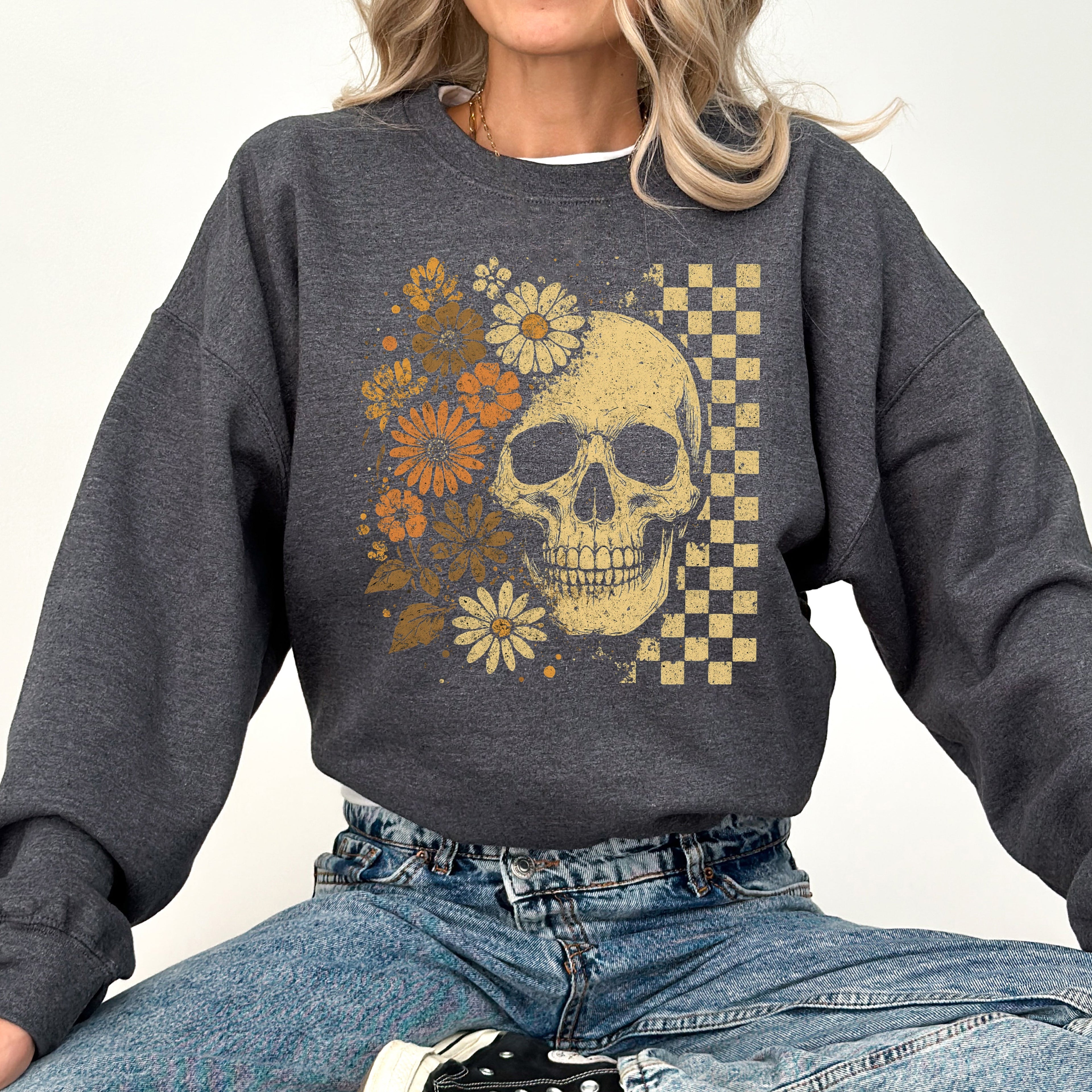Skull Between Flowers Sweatshirt — Floral & Checkered Gothic Graphic