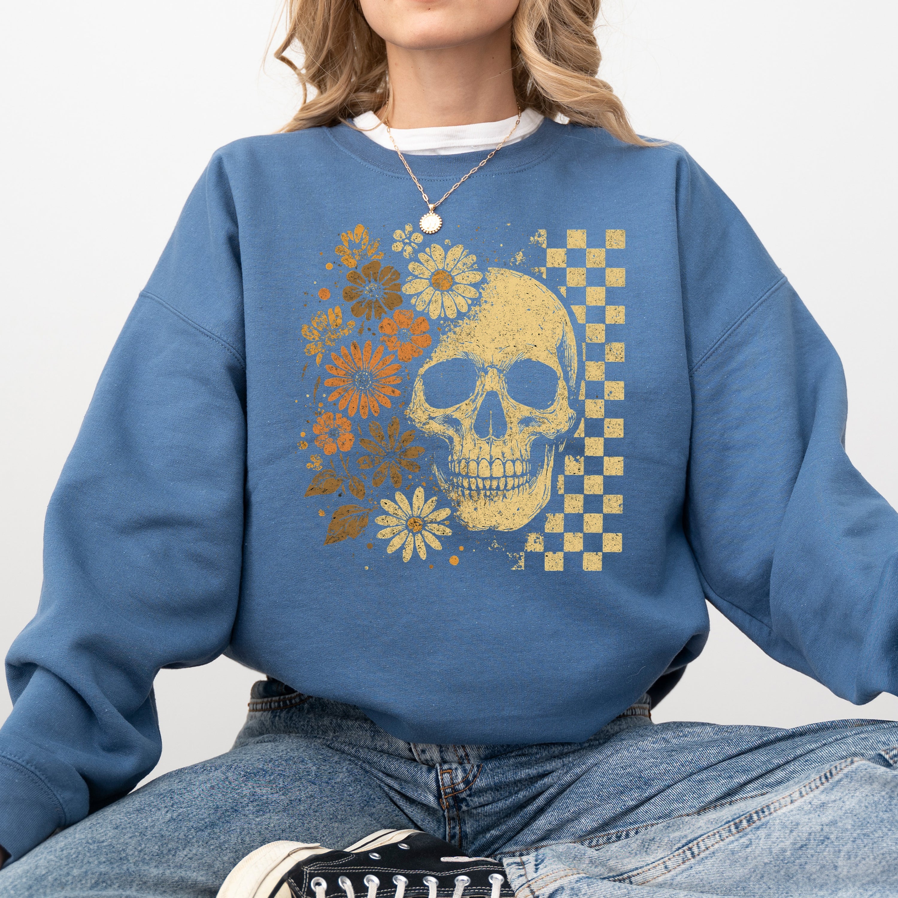 Skull Between Flowers Sweatshirt — Floral & Checkered Gothic Graphic
